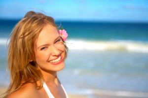 Image of a young woman at the beach on a sunny day. Sunscreen, Princeton, NJ