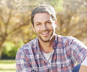 stock image of a man smiling for a blog about cosmetic injectables for men in Princeton, NJ