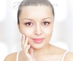 stock image of a woman smiling for a blog about Fraxel® Re:pair laser treatment in Princeton