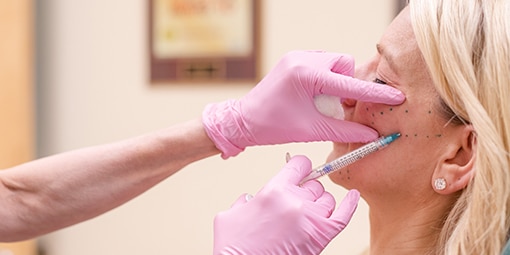 A woman getting a dermal filler from Dr. Brunner in NJ