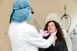 Dr. Brunner consulting with a patient interested in neck and jawline contouring in Princeton, NJ