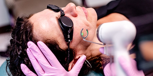 Dr Eugenie Brunner performing laser treatment on her patient, Princeton, NJ.