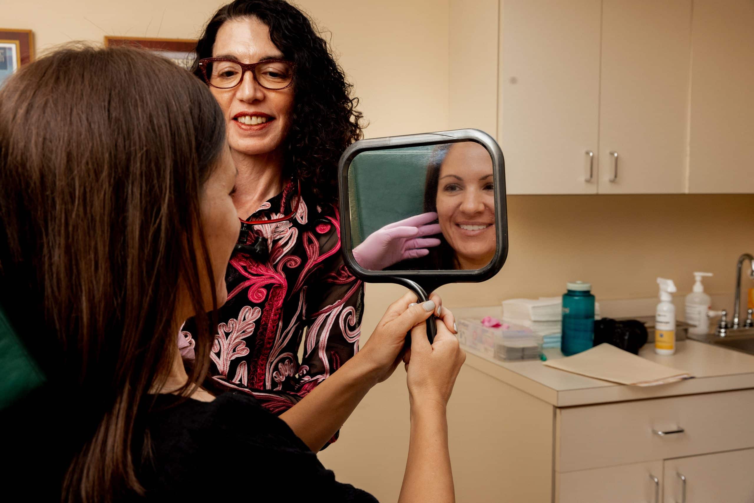 eugenie-brunner-facial-plastic-surgery-princeton-nj-dermal-fillers-injections-consultation10 plastic surgeon consulting with a patient in Princeton