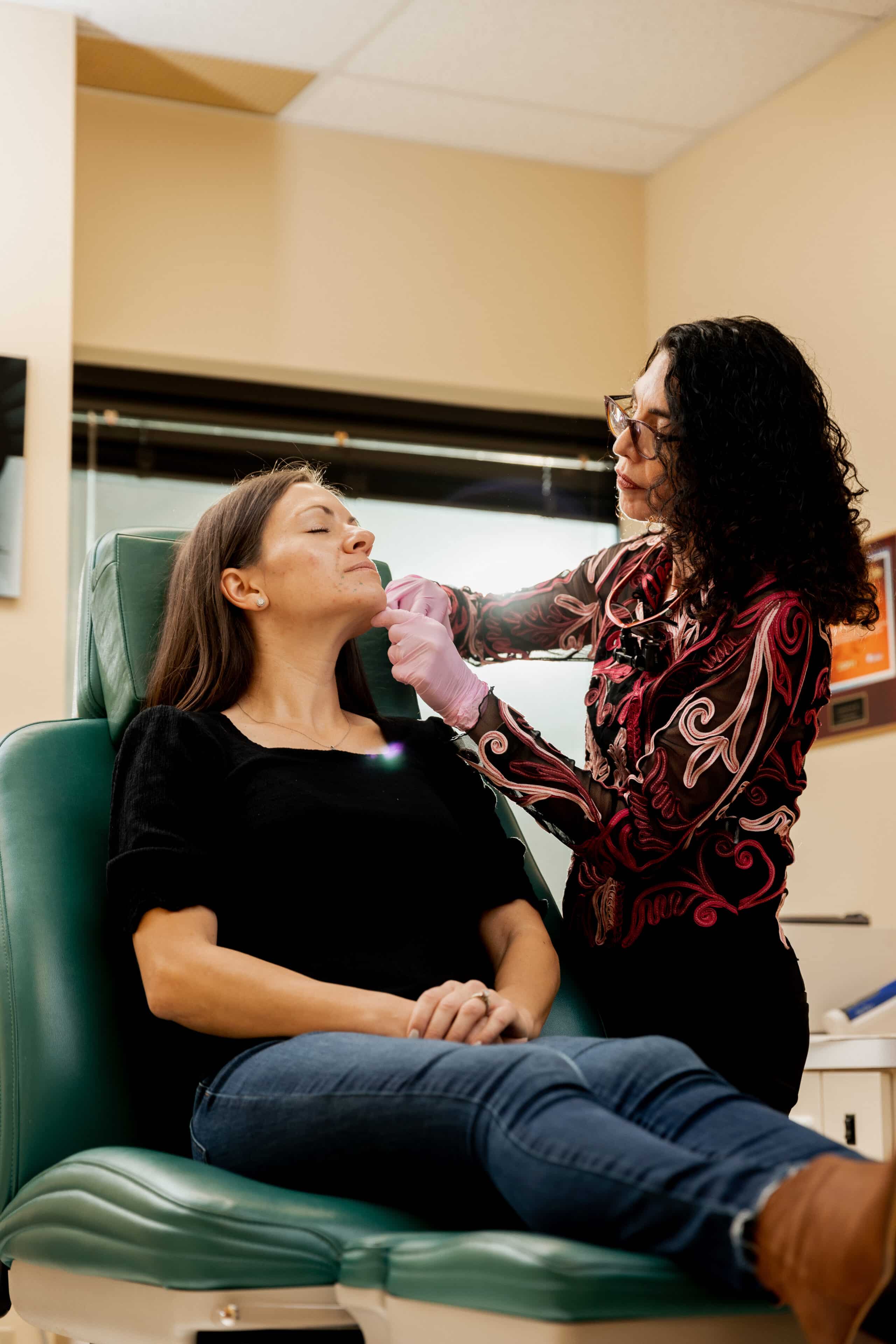 eugenie-brunner-facial-plastic-surgery-princeton-nj-dermal-fillers-injections118 plastic surgeon consulting with a patient for Versa dermal filler in Princeton