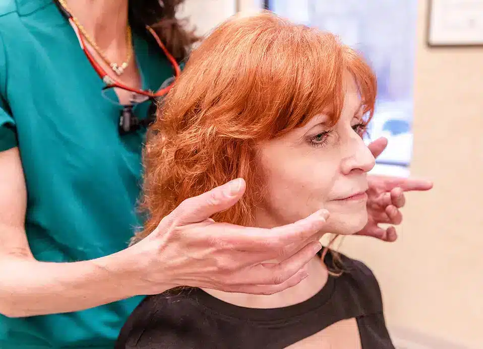 face-and-neck-contouring-treatment-Princeton-NJ-optimized Dr. Brunner with a patient during a consultation for Smartlipo in Princeton