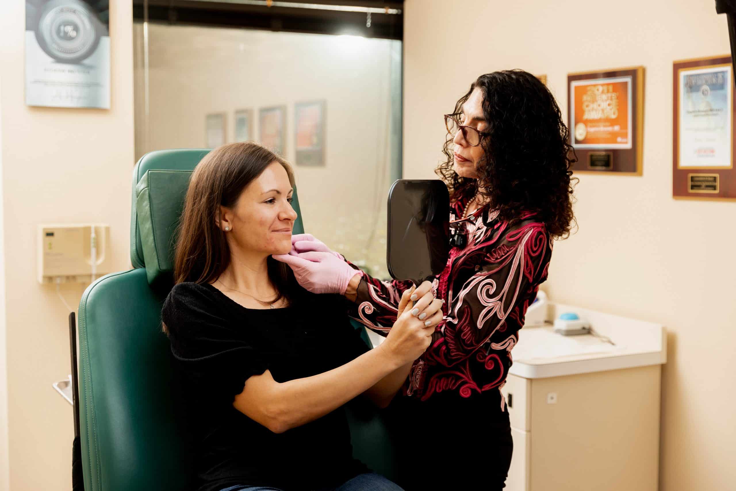 eugenie-brunner-facial-plastic-surgery-princeton-nj-non-surgical-neck-lift-consultation1 Dr. Brunner with a patient during a consultation for a non-surgical neck lift in Princeton, NJ