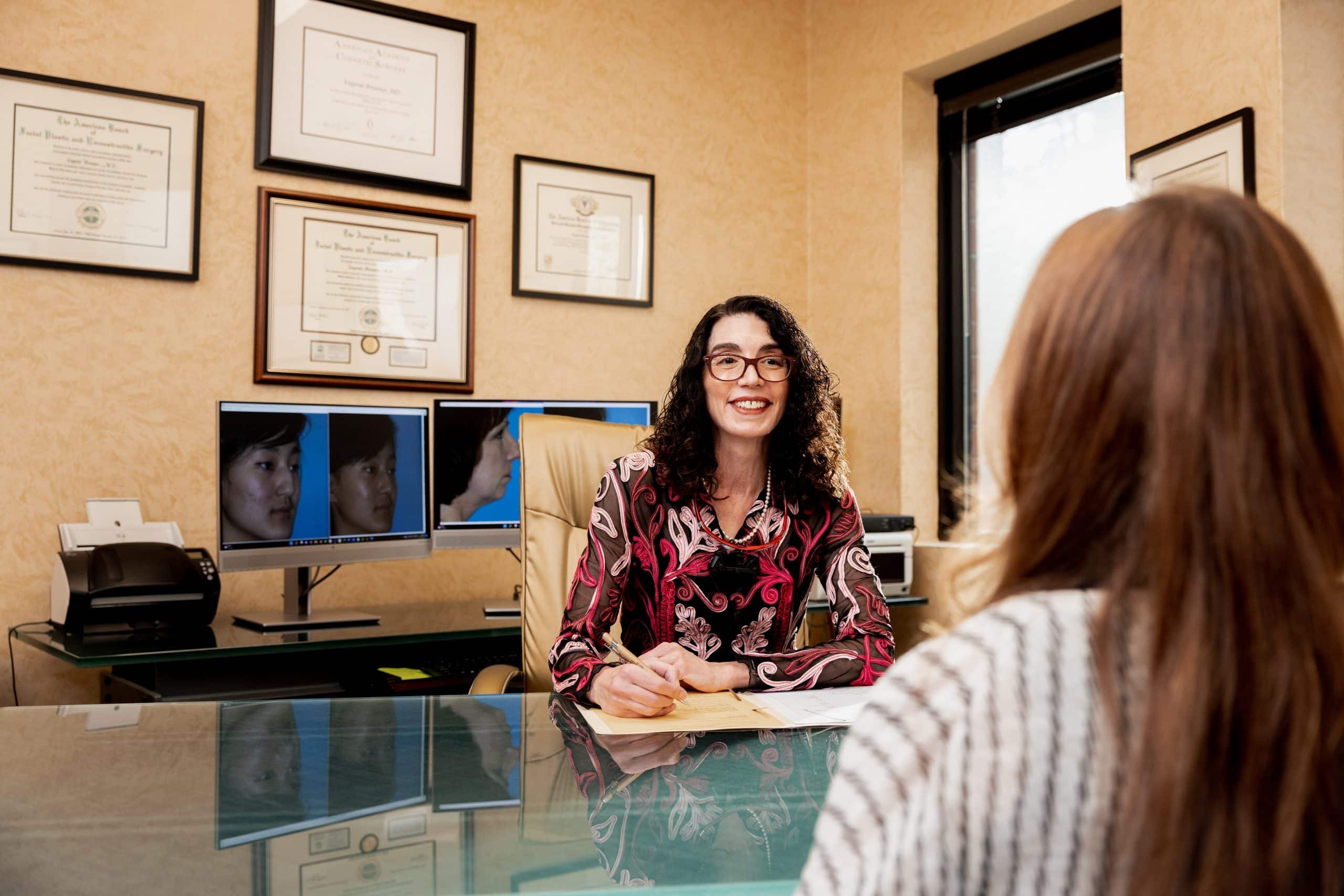 eugenie-brunner-facial-plastic-surgery-princeton-nj-non-surgical-neck-lift-consultation2 Dr. Brunner performing a non-surgical neck lift on a patient in Princeton