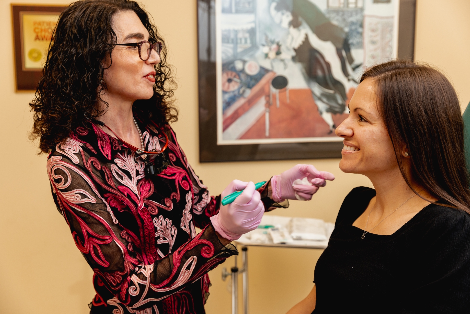 eugenie-brunner-md-facial-plastic-surgery-princeton-nj-injectables-consultation (Large) Dr. Brunner performing liquid facelift on a patient in Princeton